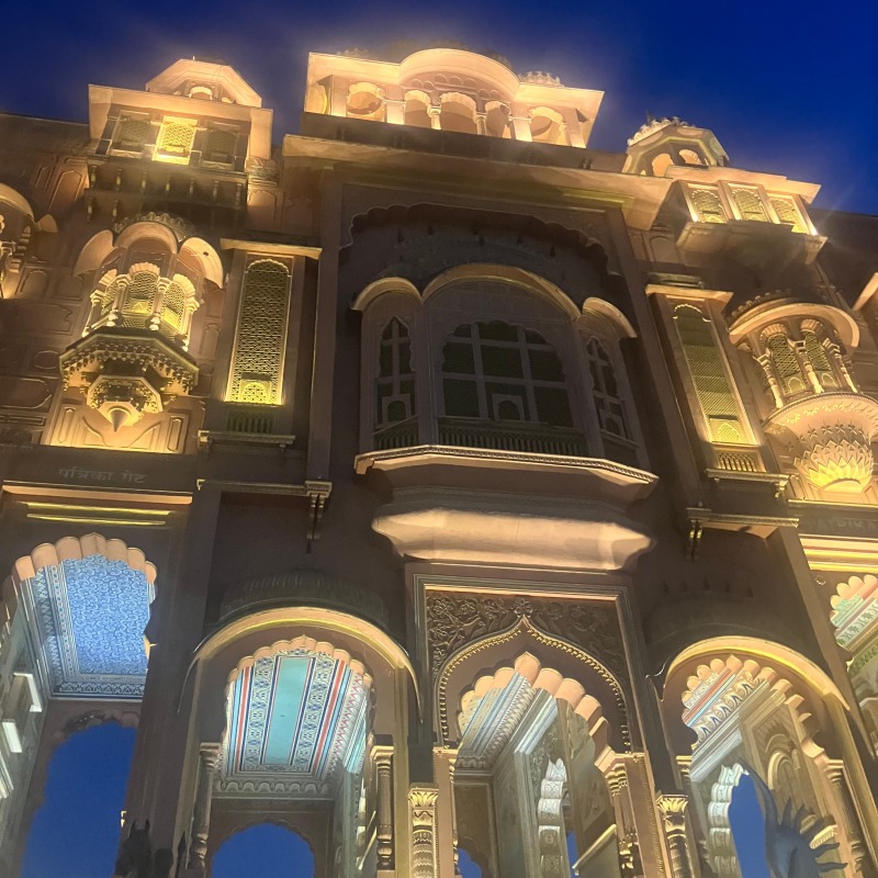 Sarasvati cover artwork showing an illuminated facade in India